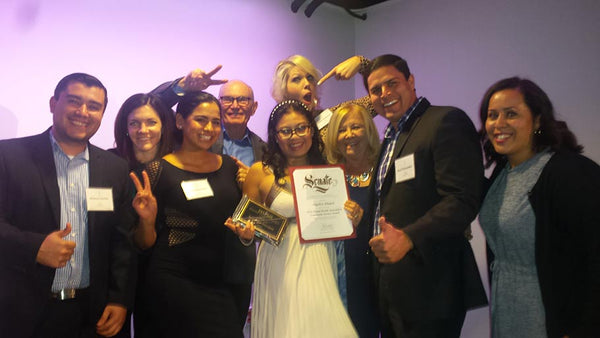 Jamboree staff, partners and resident, Angelica Sinajon, MHA Community Service Award nominee.