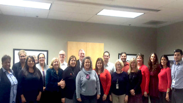 Orange County Housing Collaborative visits Jamboree offices to celebrate 40 homeless in supportive housing.