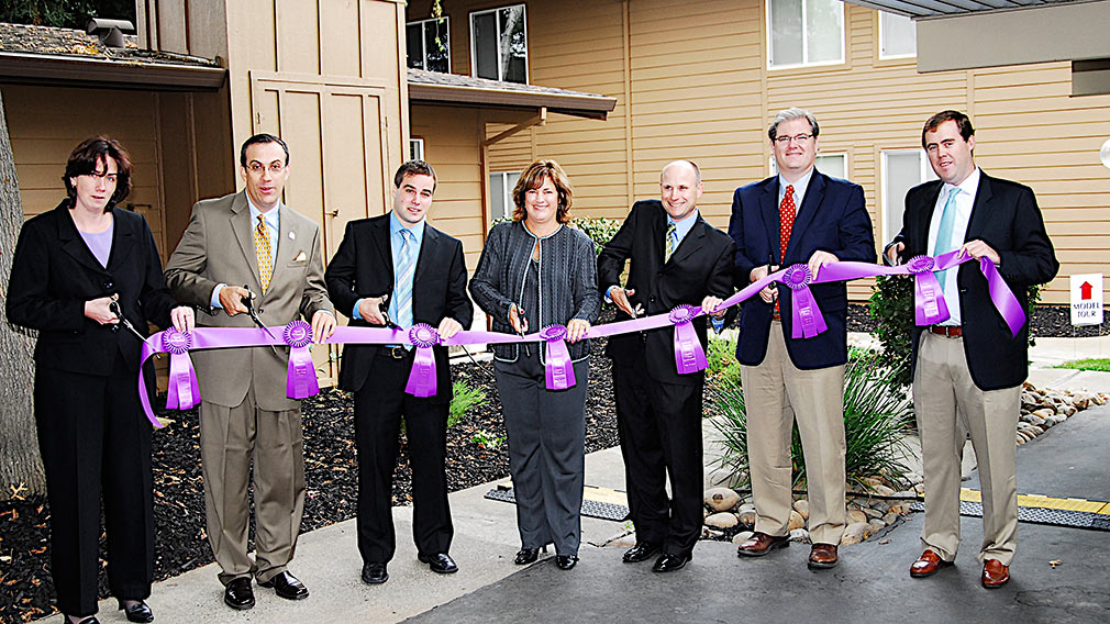 Partners at a Jamboree affordable community ribbon cutting event 

